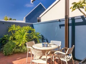 Stylish open plan lounge and dining area in KnysnaQuays 4 luxury holiday apartment