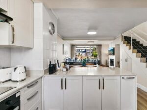 Stylish open plan lounge and dining area in KnysnaQuays 4 luxury holiday apartment