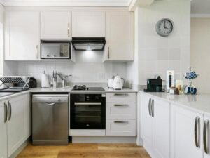Stylish open plan lounge and dining area in KnysnaQuays 4 luxury holiday apartment