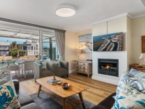 Stylish open plan lounge and dining area in KnysnaQuays 4 luxury holiday apartment
